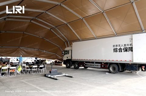 Fabric covered clamshell hangar