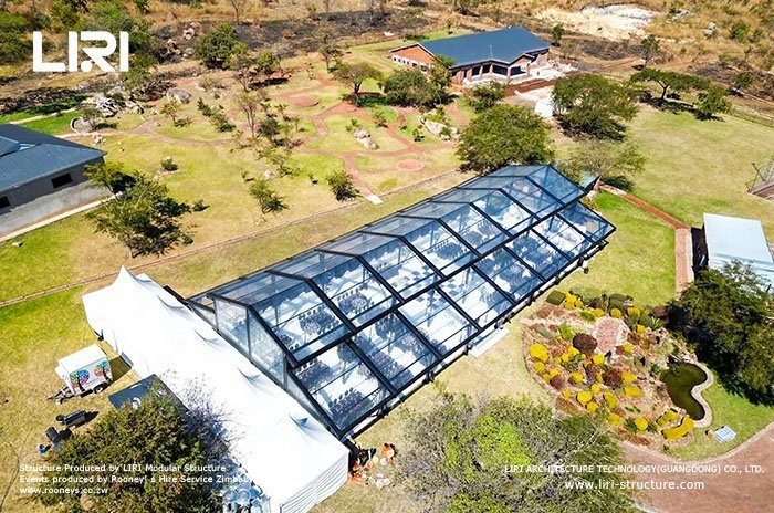 Atrium tent interior with transparent walls and unobstructed space Atrium tent interior with transparent walls and unobstructed space