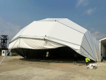 20m Eyelid Hangar Tent with polygonal canopy partially open at Nigeria airport