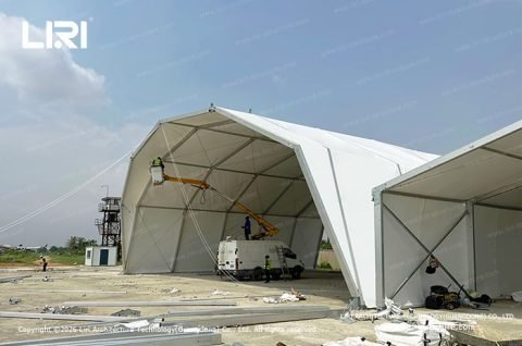 Twin Eyelid Hangar Tents exterior view during site installation