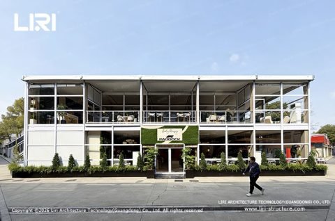 Two story tent F1 Paddock Club front glass facade with Paddock signage panel