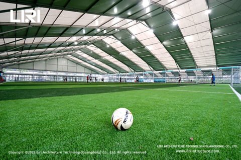 Indoor football turf field under modular sports hall roof