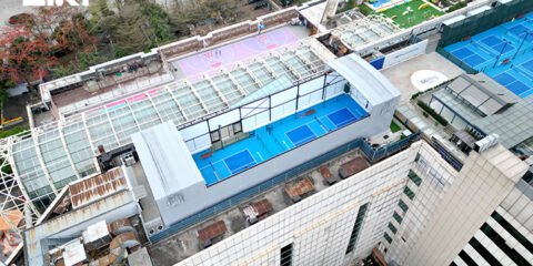 Rooftop pickleball court with retractable roof shown from above
