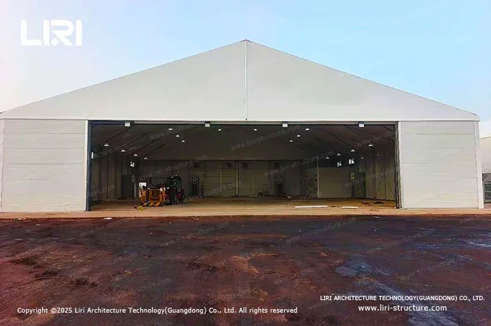 Wide span industrial aircraft hangar tent with open front entrance