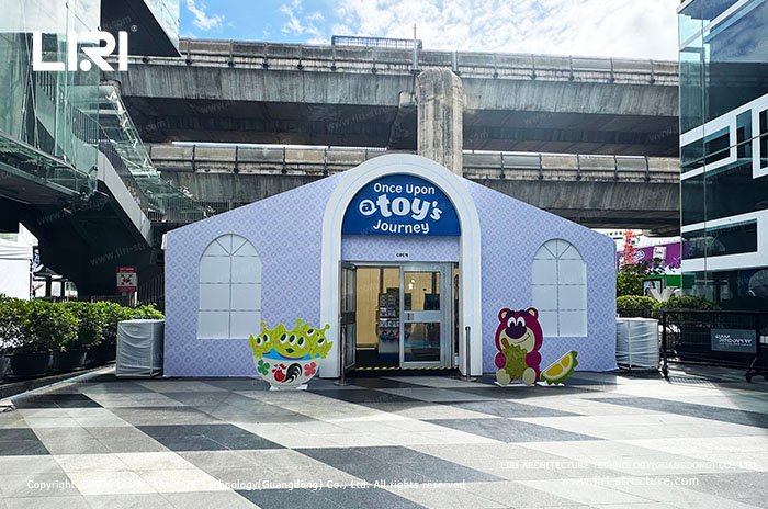 Branded modular pop-up store entrance for the Once Upon a Toy's Journey campaign