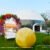 Geodesic dome tent at an outdoor brand pop-up event with a floral entrance