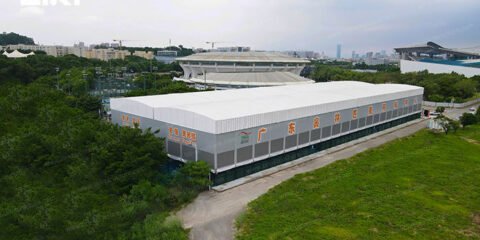 Large sports tent exterior designed for two tennis courts