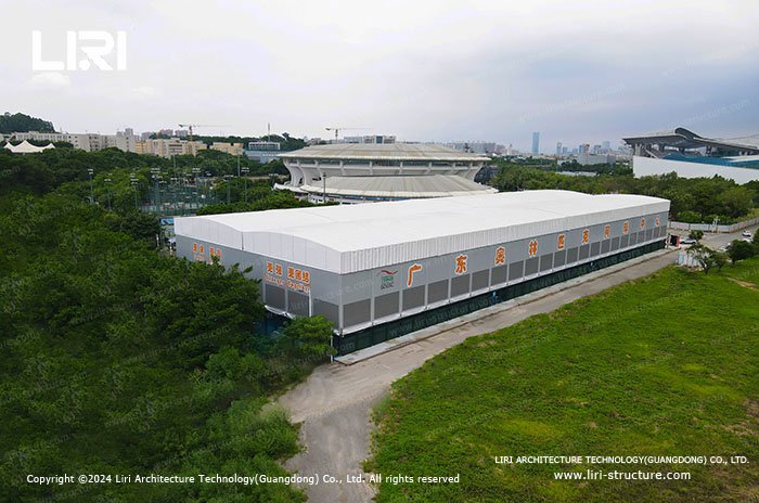 Large sports tent exterior designed for two tennis courts
